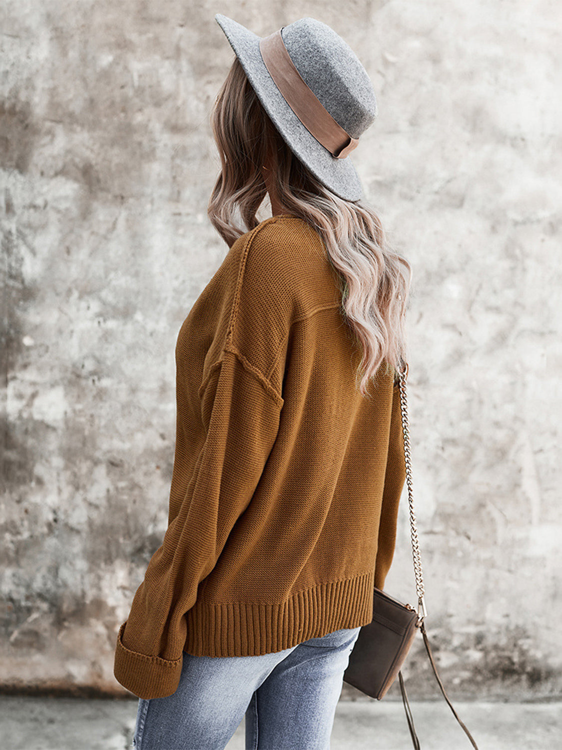 Buttoned Exposed Seam Knit Top